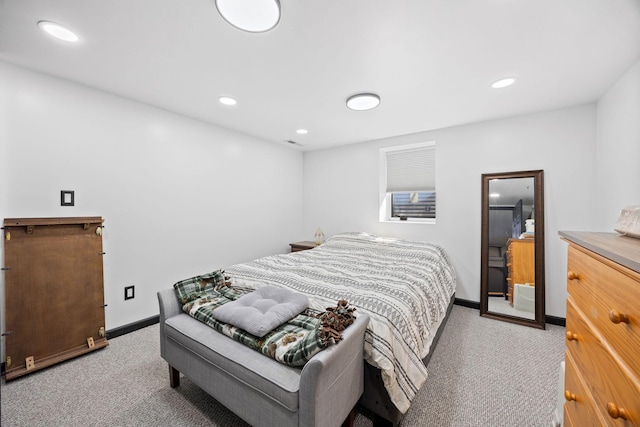 bedroom featuring recessed lighting, visible vents, baseboards, and light colored carpet