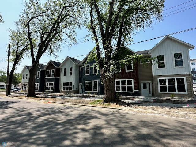 multi unit property featuring board and batten siding