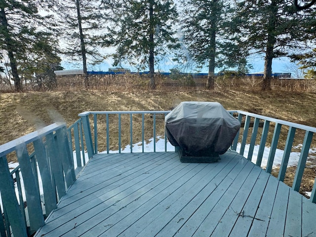 deck with grilling area and fence