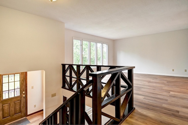 21414 Tulip St NW, Oak Grove, MN 55303 - stairs with wood finished floors and baseboards