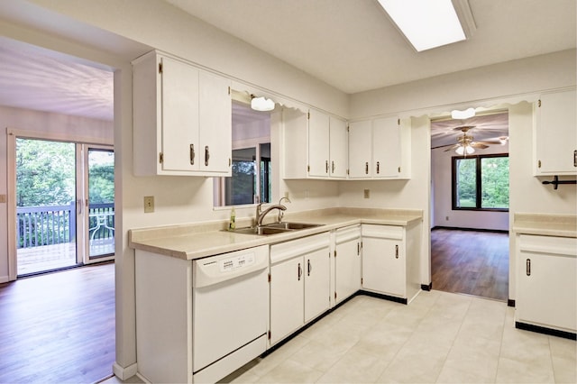 21414 Tulip St NW, Oak Grove, MN 55303 - kitchen featuring white dishwasher, light countertops, and white cabinets