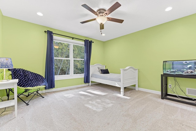 unfurnished bedroom featuring visible vents, recessed lighting, baseboards, and carpet floors