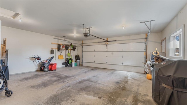 garage featuring a garage door opener