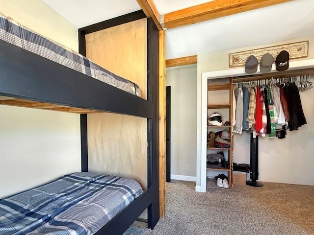 carpeted bedroom with a closet