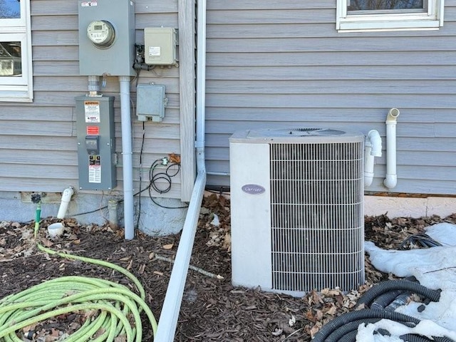 exterior details with central AC and electric meter