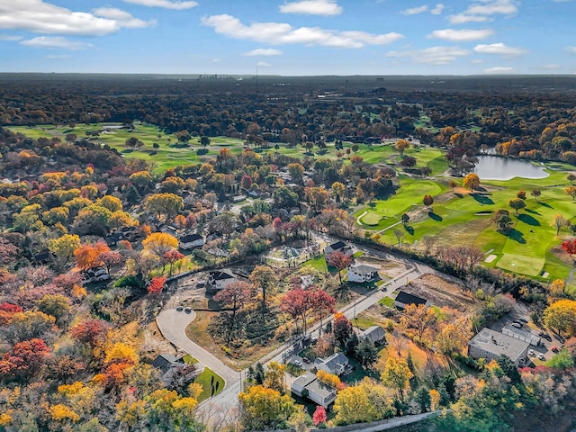 birds eye view of property featuring a water view and view of golf course