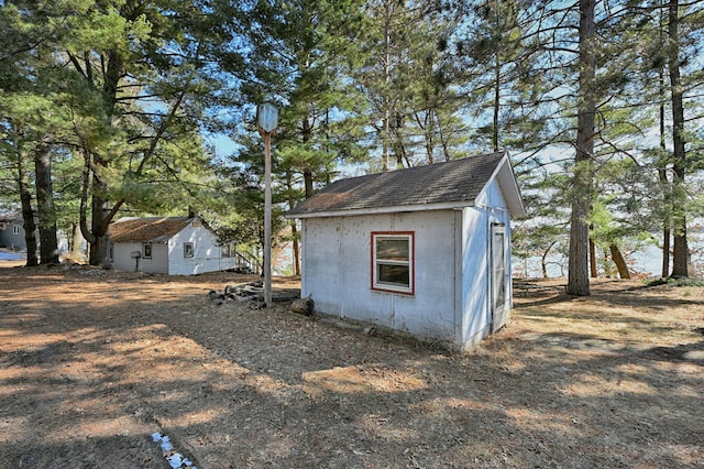 view of outbuilding featuring an outdoor structure