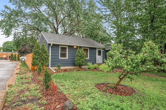 5413 42nd Ave S, Minneapolis, MN 55417 - view of front facade with a chimney, driveway, and a shingled roof