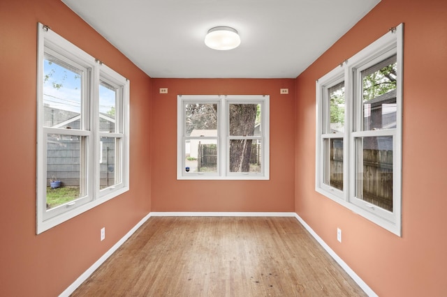5413 42nd Ave S, Minneapolis, MN 55417 - unfurnished room with light wood-type flooring and baseboards