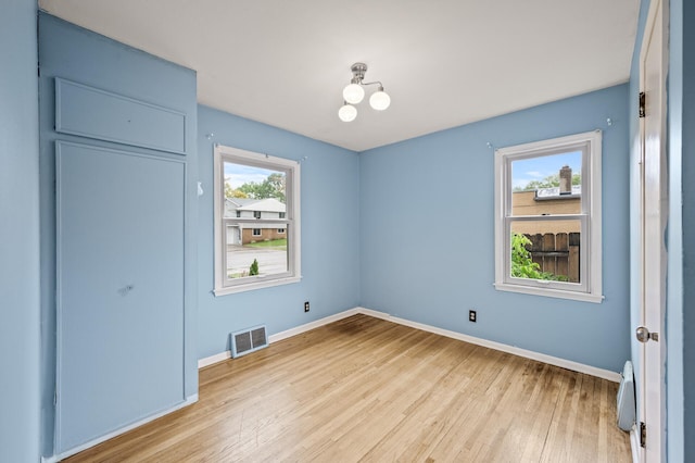 5413 42nd Ave S, Minneapolis, MN 55417 - unfurnished bedroom featuring light wood-style flooring and baseboards