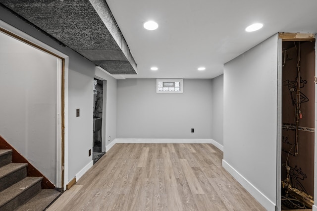 5413 42nd Ave S, Minneapolis, MN 55417 - below grade area featuring light wood finished floors, recessed lighting, baseboards, and stairs