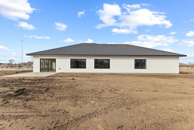 back of house with a patio area