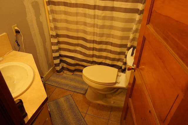 full bathroom with vanity, tile patterned floors, toilet, and a shower with shower curtain