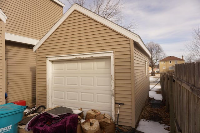 garage featuring fence