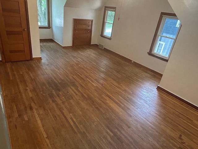 338 S St, Owatonna, MN 55060 - additional living space featuring dark wood-style flooring and healthy amount of natural light