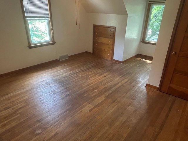 338 S St, Owatonna, MN 55060 - bonus room featuring wood-type flooring