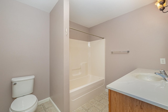 bathroom featuring tile patterned floors, toilet, shower / bath combination, baseboards, and vanity