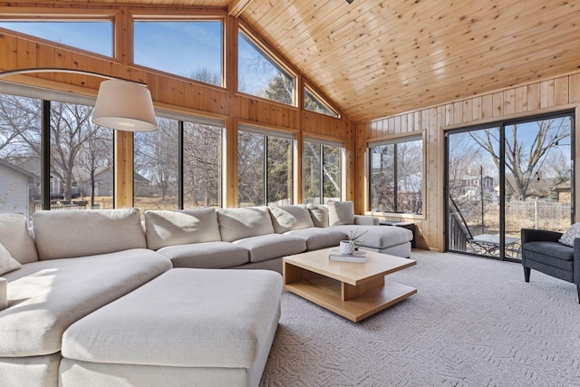 carpeted living room featuring wooden walls, wood ceiling, beamed ceiling, and high vaulted ceiling