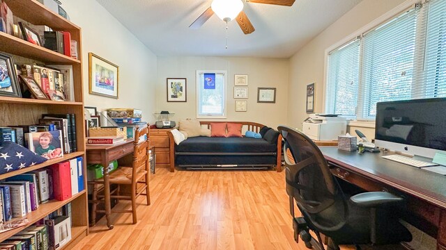 home office featuring a ceiling fan and wood finished floors