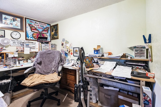 office area featuring a textured ceiling