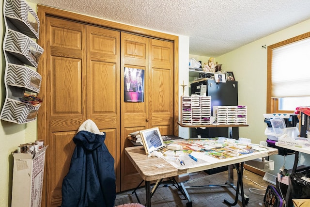 office with a textured ceiling