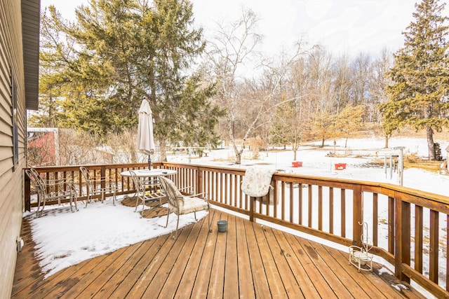 view of snow covered deck