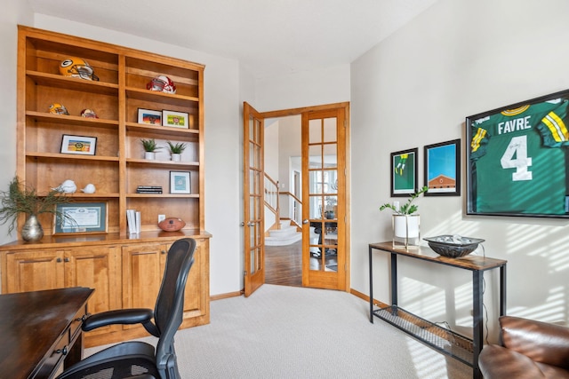 home office with french doors, baseboards, and carpet floors