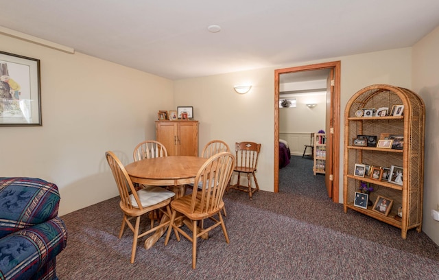 dining area featuring carpet