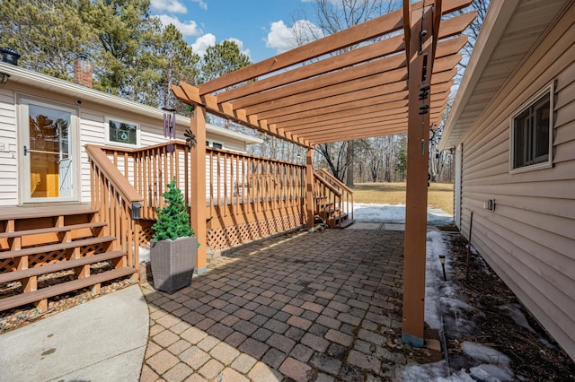 view of patio / terrace with a pergola and a wooden deck