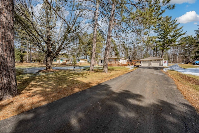 view of road with driveway