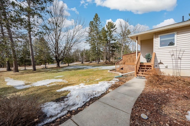 view of yard with a deck