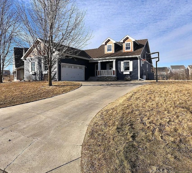 view of front of home featuring an attached garage and driveway