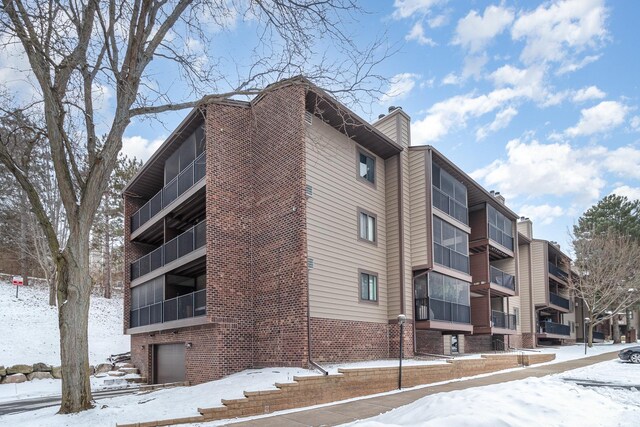 view of snow covered property