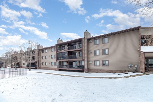 view of snow covered building