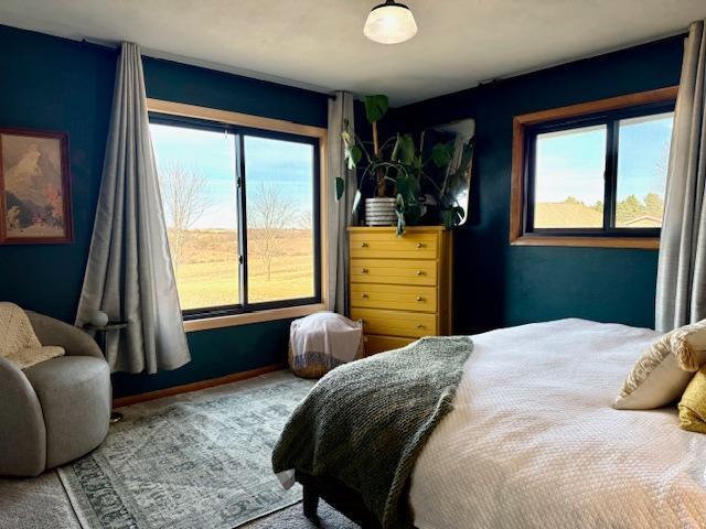 bedroom featuring baseboards