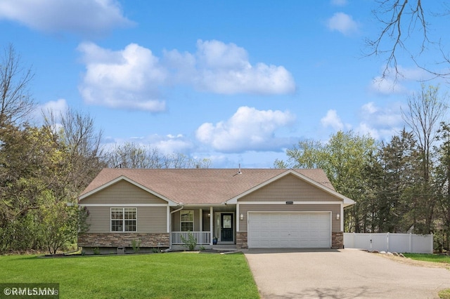 28942 Dawson Ave, Randolph, MN 55065 - view of front of house featuring a porch, driveway, an attached garage, and stone siding