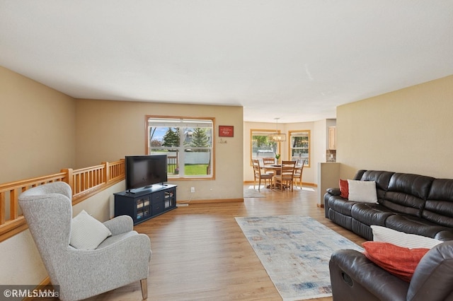 28942 Dawson Ave, Randolph, MN 55065 - living room featuring wood finished floors and baseboards