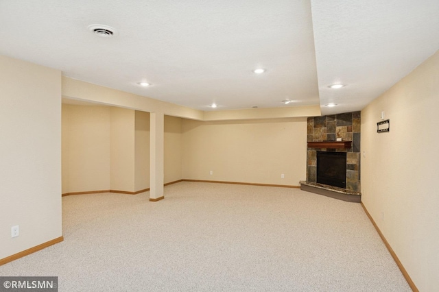 28942 Dawson Ave, Randolph, MN 55065 - finished basement with a stone fireplace, carpet flooring, baseboards, and recessed lighting