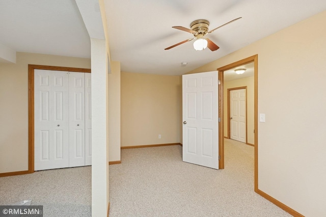 28942 Dawson Ave, Randolph, MN 55065 - unfurnished bedroom featuring baseboards, carpet flooring, a closet, a ceiling fan, and lofted ceiling