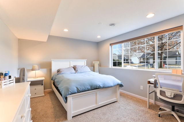 bedroom featuring recessed lighting, baseboards, and light carpet