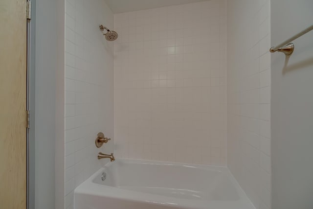 bathroom featuring  shower combination