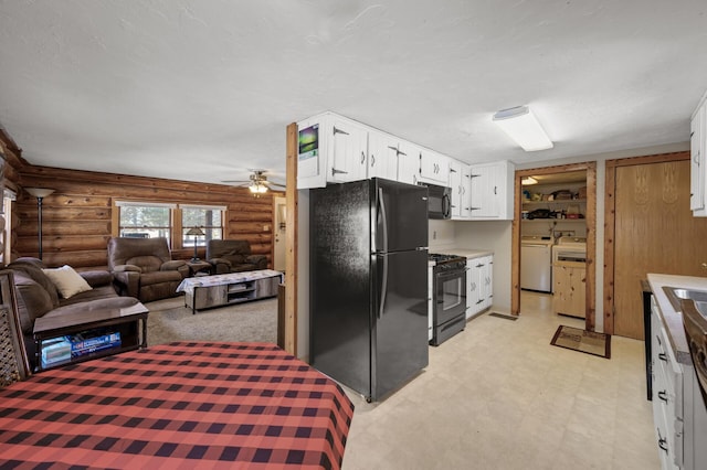 kitchen with washer and clothes dryer, light floors, white cabinets, black appliances, and a ceiling fan