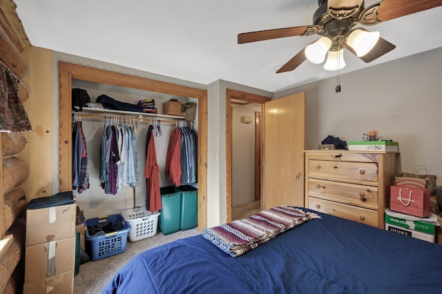 bedroom with carpet flooring, a ceiling fan, and a closet