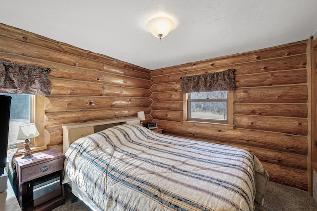 bedroom featuring rustic walls