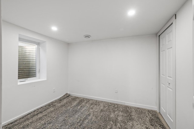 interior space featuring recessed lighting, visible vents, baseboards, and carpet floors