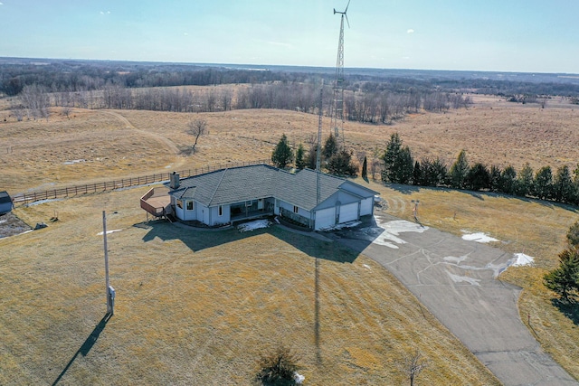 birds eye view of property with a rural view