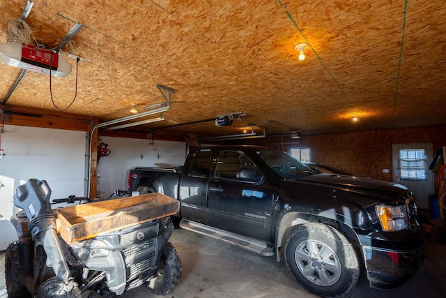 garage featuring a garage door opener