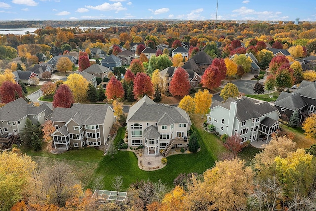 aerial view with a residential view and a water view