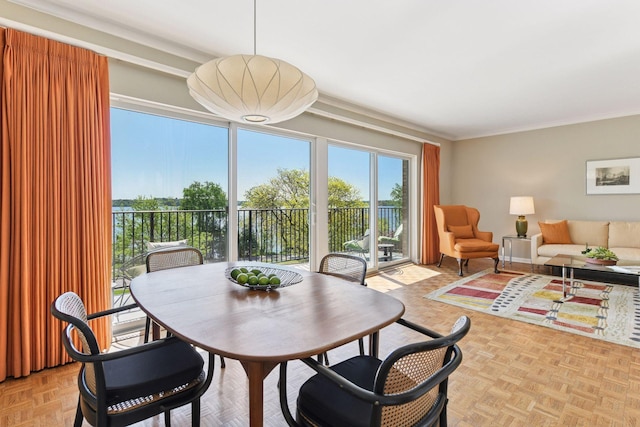 3200 Bde Maka Ska Pkwy Unit 302, Minneapolis, MN 55416 - dining space featuring ornamental molding