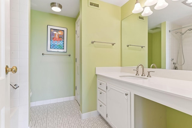 3200 Bde Maka Ska Pkwy Unit 302, Minneapolis, MN 55416 - full bathroom featuring a shower, vanity, and baseboards